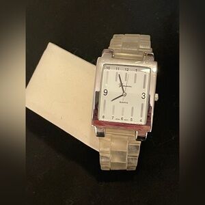 Stylish Silver and clear silicone band.Watch 
Unique design 
Good used condition